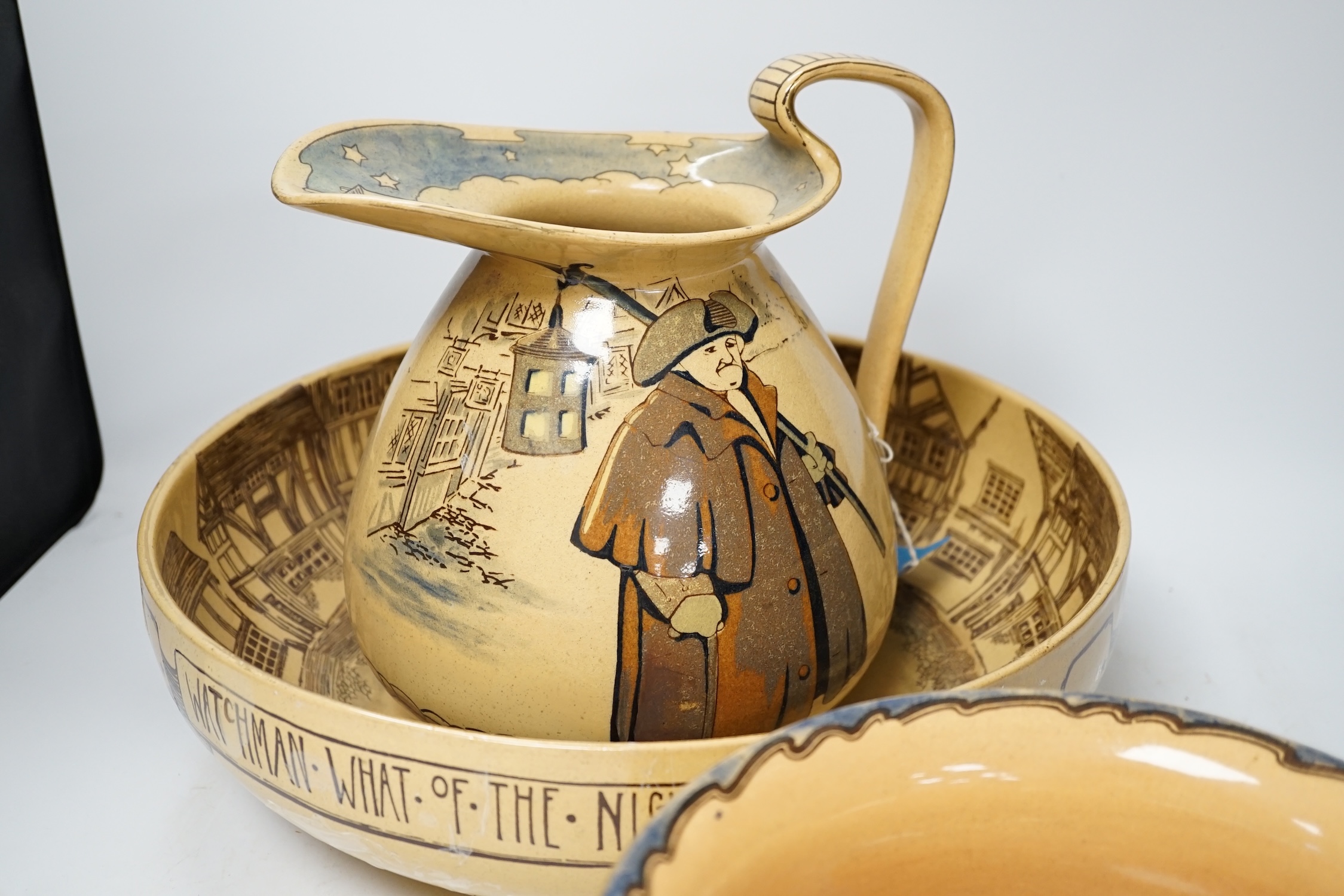 A Royal Doulton pottery Night Watchman three piece toilet set comprising wash jug, basin and chamber pot, largest 36cm in diameter. Condition - fair, basin with wear